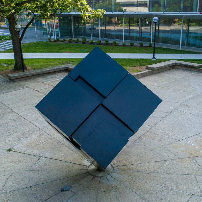 The black cube sculpture, officially titled “Endover,” on campus near the LSA Building and Union.